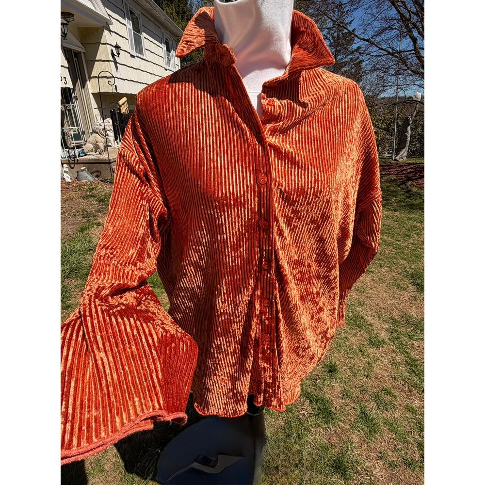 Rust shimmery long sleeved collared soft ribbed shirt